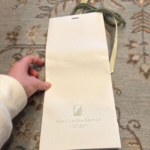 Van Cleef & Arpels Cream Bag with Green Ribbon